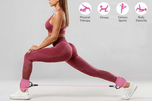 Woman performing glute workout using ankle resistance bands with cuffs