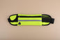 yellow running waist pack for travel and jogging with multiple zipper pockets
