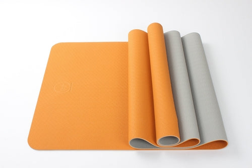 Two-tone yoga mats in grey and orange – non-toxic TPE material for everyday training

