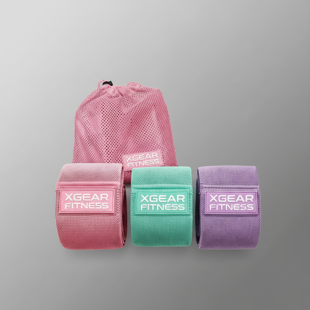 Set of fabric resistance bands in different colors with storage bag for home workout and gym use