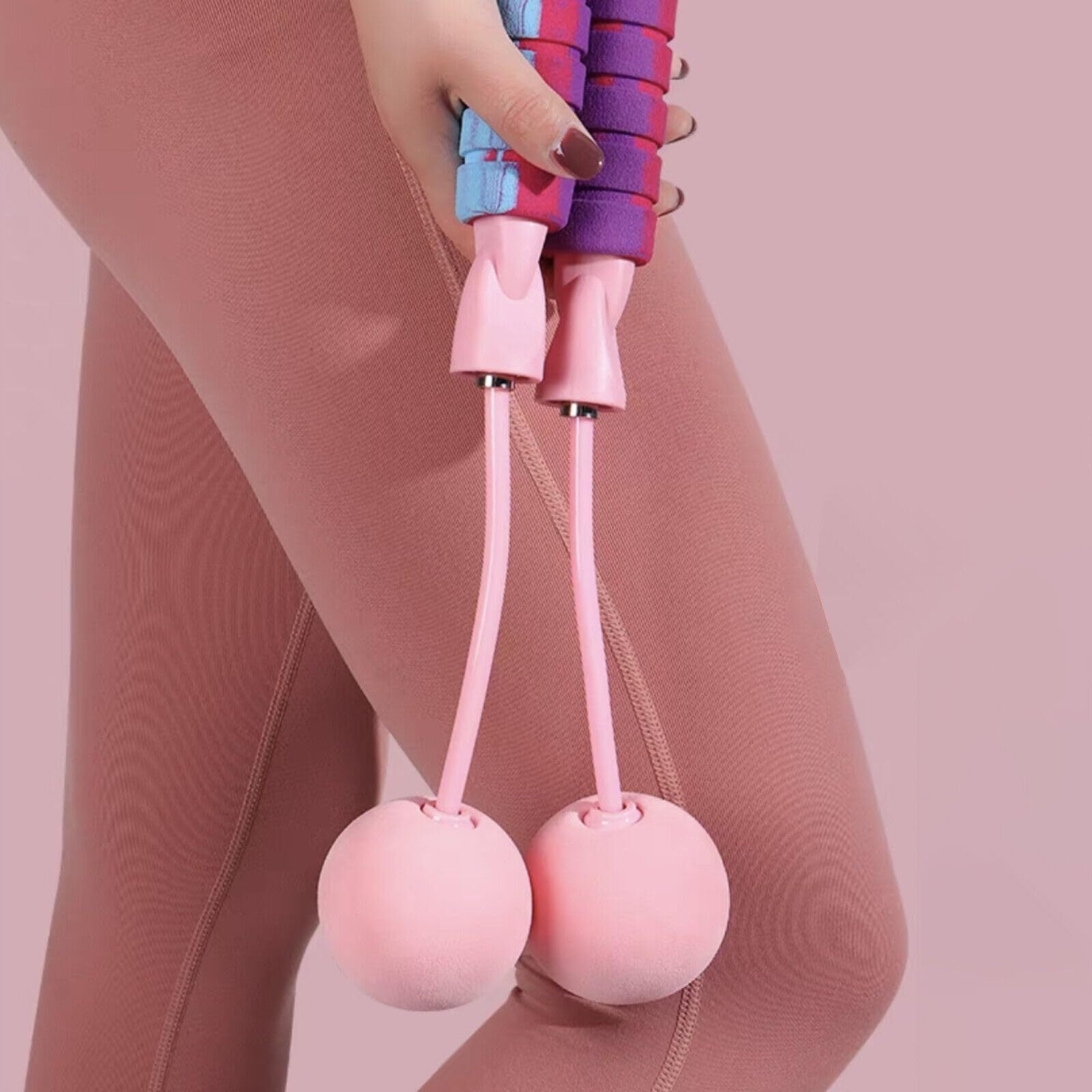 Woman using a weighted cordless jump rope for cardio exercise