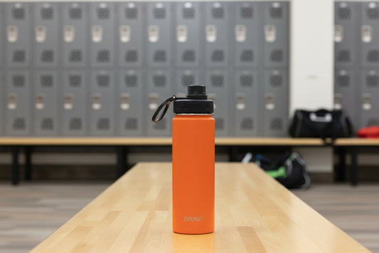 Barn orange stainless steel water bottle in backpack for everyday hydration
