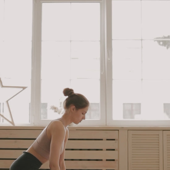 Standing yoga pose on eco mat – smooth surface for strength and balance exercises