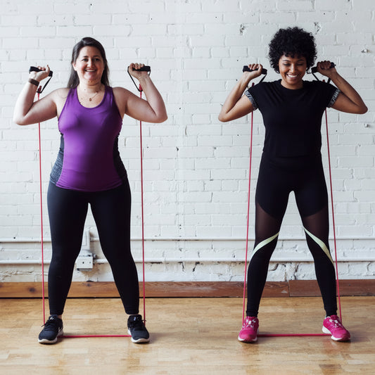 Partner training with resistance bands – movement for strength, balance, and coordination
